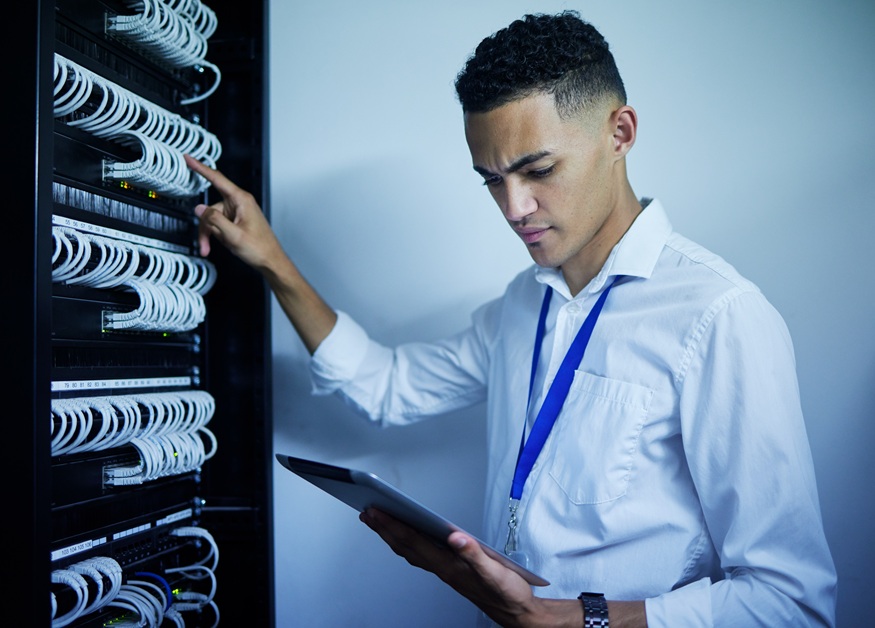 man-engineering-and-tablet-in-server-room-or-data-2025-04-06-08-08-00-utc Remote-hands-colocation-support-services-Toronto-Canada